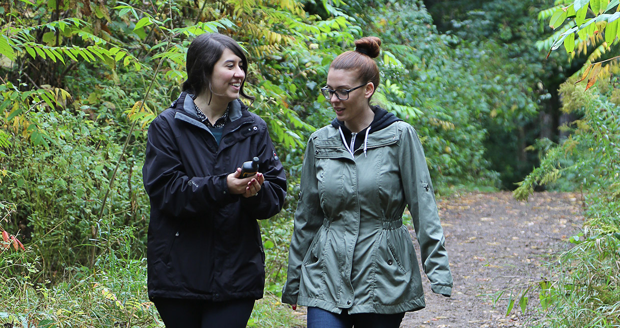 female colleagues participate in a team-building exercise at Kortright Centre