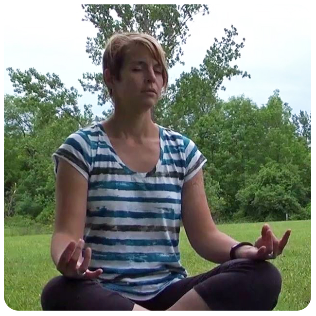 woman does yoga outdoors at Kortright Centre