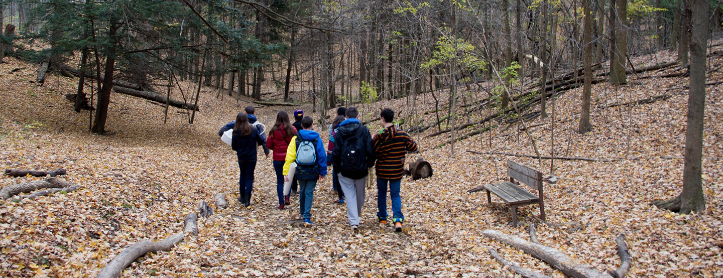 high school students explore trail at Kortright Centre