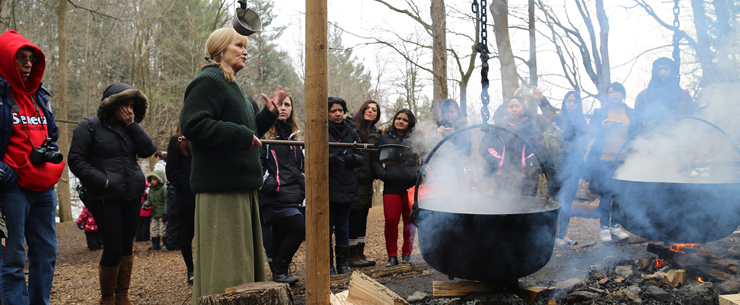 volunteer conducts Maple Syrup demonstration at Kortright Centre