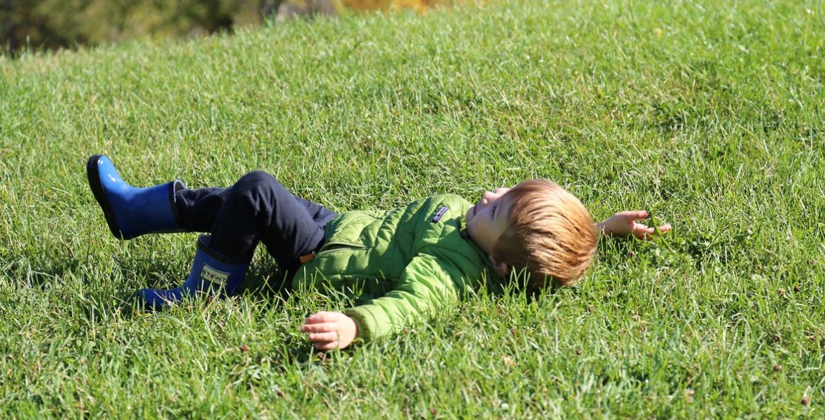 child enjoys Fresh Air Fridays camp at Kortright Centre in springtime