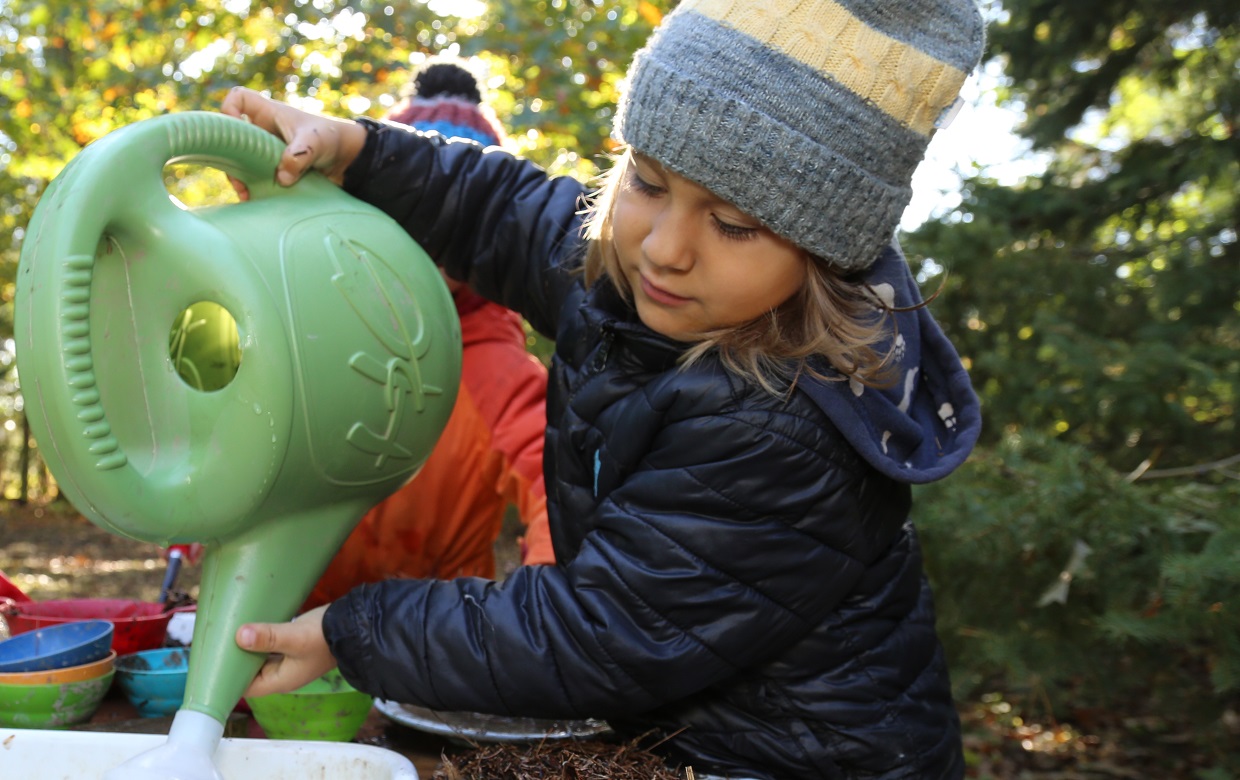 student enjoys The Nature School preschool program at Claireville Conservation Area