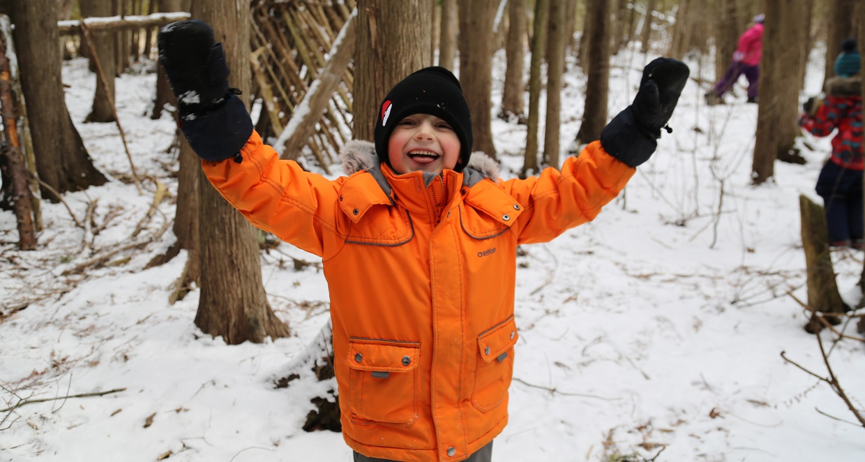 student in The Nature School junior program enjoys outdoor winter activities
