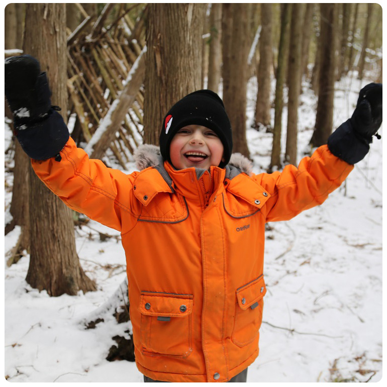 student in The Nature School junior program enjoys outdoor winter activities