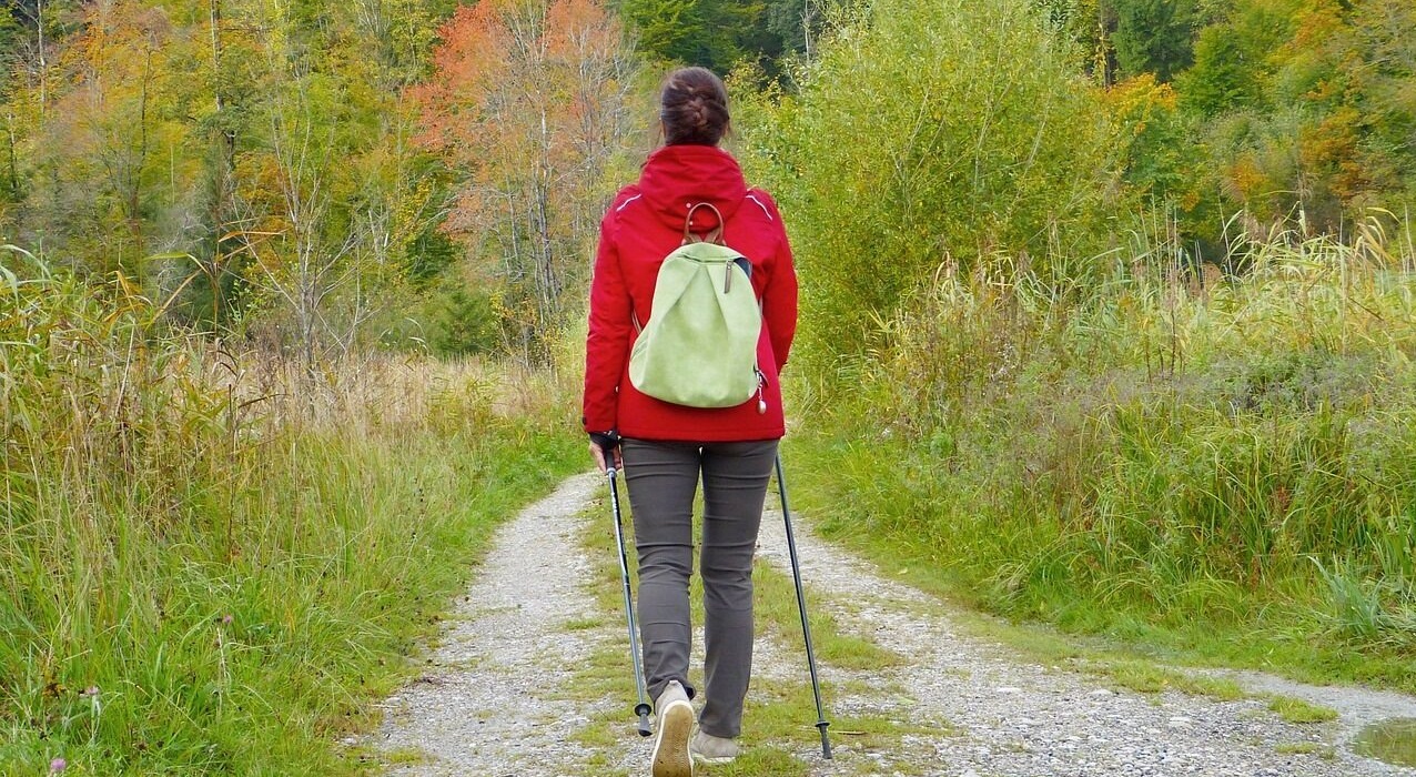 young woman takes part in outdoor wellness retreat at Kortright Centre for Conservation