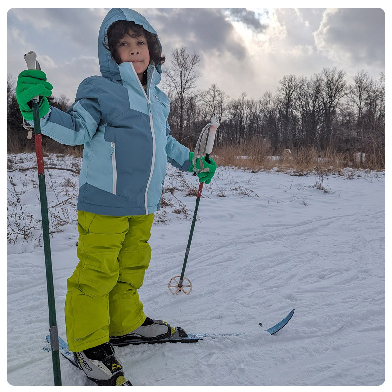 student at the Kortright Nature School learns to cross country ski on a winter day