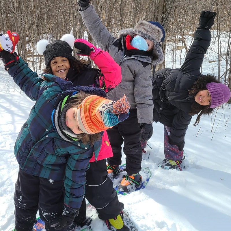 students learn to snowshoe at a TRCA winter camp at Kortright Centre